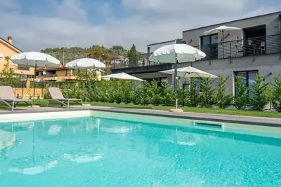 Image de Joli appartement avec piscine, climatisation, Wifi, Tv, terrasse, animaux admis et parking