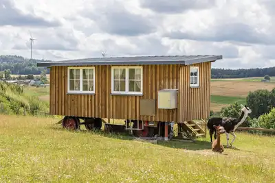 Image de Maison de vacances 'Tinyhouse Alpakawiese' avec terrasse privée et jardin partagé