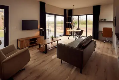 Image de The holiday villa Amalia 2 is wheelchair friendly and has a cozy, spacious, and homely living room with an open kitchen, 1 bedroom, and a spacious outdoor area.