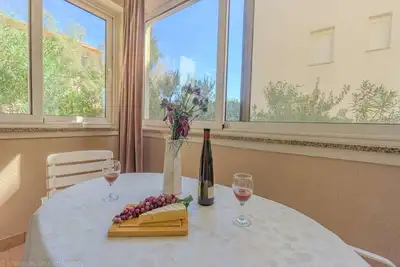 Image de Apartment directly at the beach, shared terrace on the beach with grill