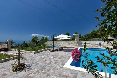 Image de Maison de vacances Makarska pour 1 - 8 personnes avec 3 chambres Ă coucher - Maison de vacances