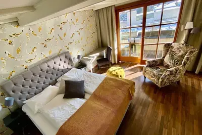 Image de Wohnzimmer Fisch & Chips Hp 1-4 Nächte - Bike-boutiquehotel Lindenhof