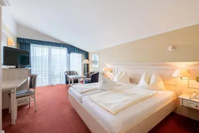 Panorama Zimmer mit Blick Über den See - Hotel Alexanderhof