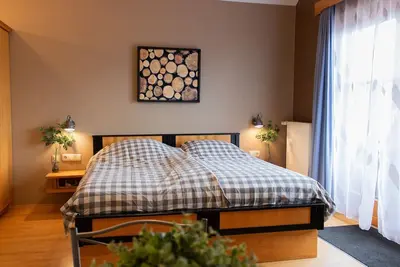 Image de Familienzimmer mit Separater Toilette und Bad und Balkon - Pension Kärnten