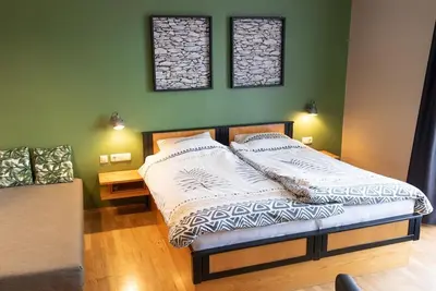 Image de Triple room with shower, Wc and balcony - Pension Kärnten
