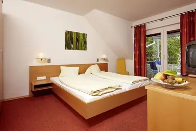 Image de Familienzimmer \"groĂźglockner Standard\" - Hotel zur Post 3superior - Ihr Familienhotel