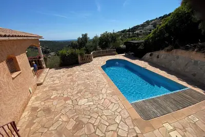 Image de Villa 'Lucio' avec vue sur mer, piscine et terrasse privée