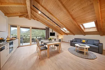 Image de Appartement 'Stöckerhof Sonne' avec vue sur les montagnes, piscine partagée et Wi-Fi