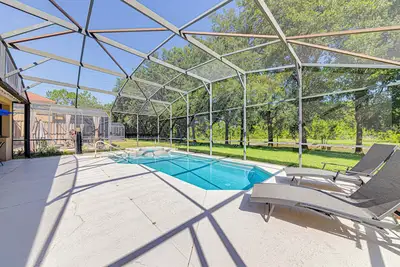 Image de New listing! Beautiful 4 Bedroom pool home in a gated resort