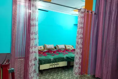 Image de Family atmosphere Guest Room With Double Bed + Single Bed With Cooling Duckting