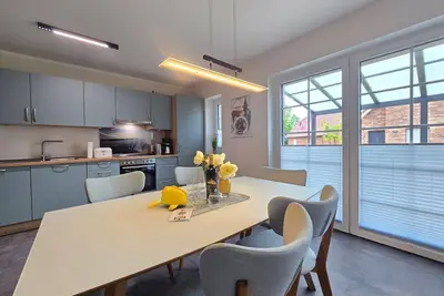 Image de Ferienhaus Golfkate Eagle - Willkommen in Unserem Brandneuen Ferienhaus am Deich!