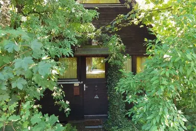 Image de Maison de vacances 'Ferienhaus Bergwiese' avec vue sur montagne, jardin privé et balcon