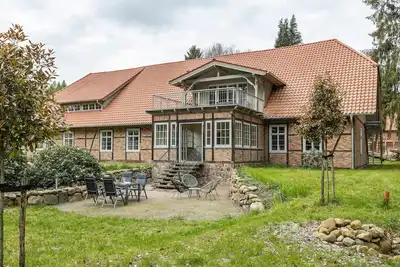 Image de Appartement de vacances 'Suite avec véranda d'hiver' avec vue sur la montagne, directement au bord du lac de baignade et Wi-Fi
