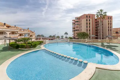 Image de Maison de vacances 'Playa Arenales Del Sol' avec vue sur la mer, Wi-Fi et climatisation