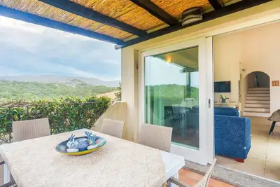 Image de Appartement 'Appartamento Vue sur Mer' avec piscine partagée, terrasse privée et climatisation