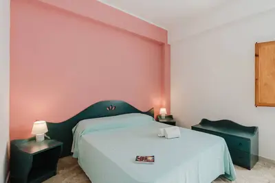 Image de Appartement 'Appartamento Standard 6' avec piscine partagée, Wi-Fi et climatisation
