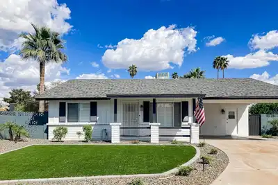 Single-story house with private pool, outdoor living space, & chef's kitchen