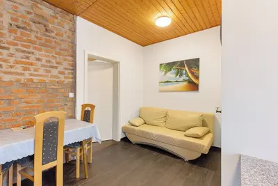 Image de Appartement 'Erdgeschoss' avec terrasse partagée, jardin partagé et Wi-Fi