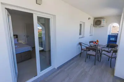 Image de Bel appartement pour 4 personnes avec climatisation, Wifi, Tv, terrasse et parking