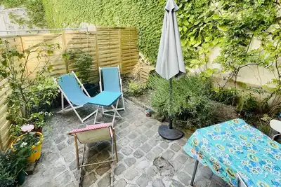 Image de Bel appartement avec jardin et places pour les Jo au centre de Paris