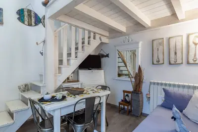 Image de Maison de vacances 'La Casetta Del Mare' avec jardin partagé, Wi-Fi et climatisation