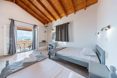 Image de Appartement 'Kavos Panorama 116 4 Person' avec vue sur mer, Wi-Fi