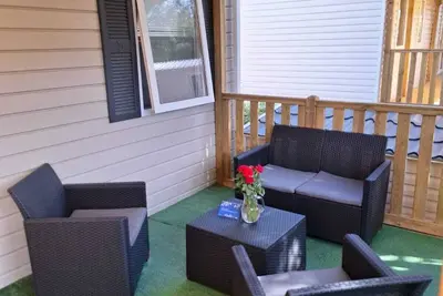 Image de Mobil-home 'Mobil-home Camping Mar Estang' avec vue sur lac, piscine partagée et climatisation