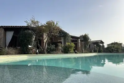 Image de Elegant poolside cottage by the turquoise sea of Chia