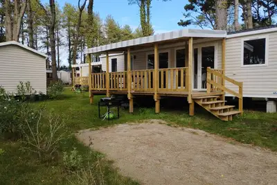 Image de A 15 minutes à pied de la plage, loue mobil home 3 pièces sur camping 4 ****