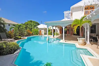 Caribbean villa with award winning pool amidst tropical garden