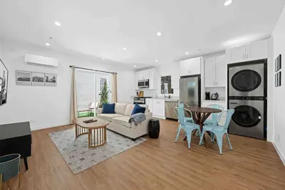 Image de Brand New Spanish Style Home in Heart of La Unit 1