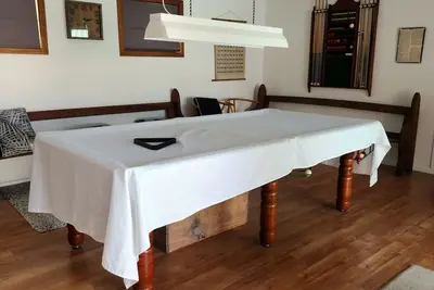 Image de Gourmet Kitchen, swimming pool, Games rooms. Outdoor area with Bbq and table