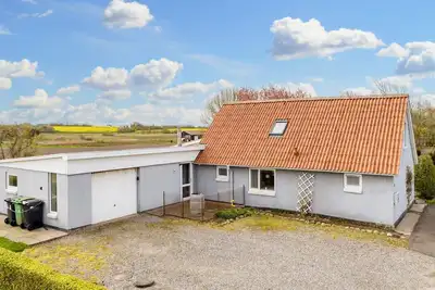 Image de Maison de vacances pour 9 a Thyholm-By Traum