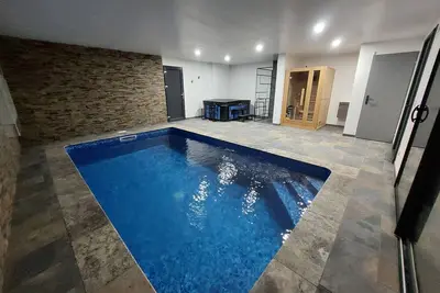 Image de Gîte luxueux avec piscine chauffée, jacuzzi et sauna rien que pour vous