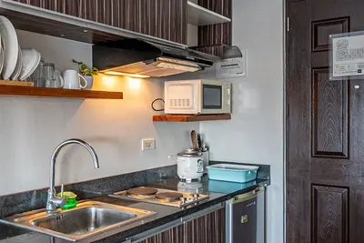 Image de Condo • Wifi up to 100mbps • Infinity Pool