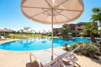 Image de Cosy Appt Vue sur Golf et Atlas