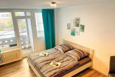 Image de Apartment Nähe Flughafen Dus mit Balkon