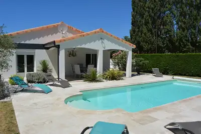 Image de Maison Les Mathes / La Palmyre piscine chauffée centre ville