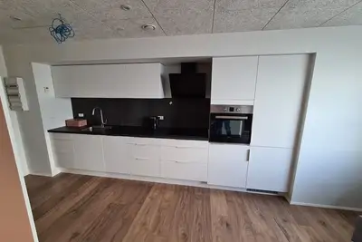 Image de Modern Apartment Overlooking Tórshavn Skyline