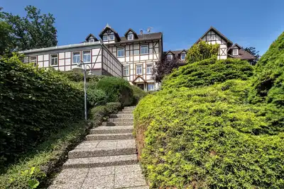 Image de Appartement \"Die Käuzchenkuhle\" avec vue sur les montagnes, terrasse privée et Wi-Fi