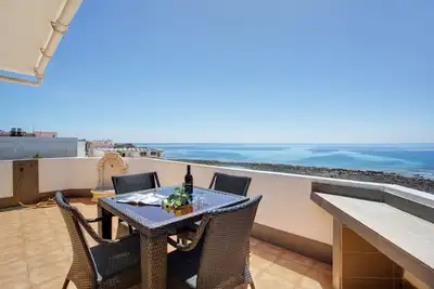 Image de Maison de vacances 'Apartamento Olas y Mar' avec vue sur la mer, terrasse privée et Wi-Fi