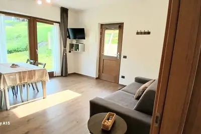 Image de Appartement 'Vallaccia' avec vue sur les montagnes, jardin partagé et Wi-Fi