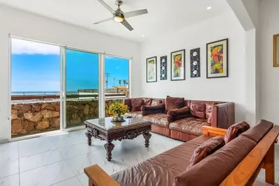 Dog-friendly home with partial ocean view, heated pool, rooftop terrace