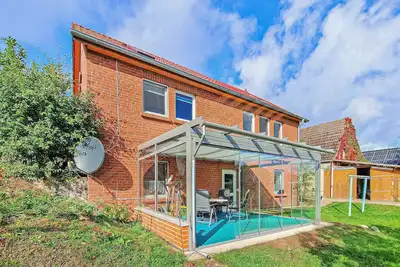Image de Ferienhaus Woldzegarten