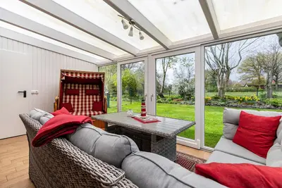 Image de Maison de vacances 'De Lüüte Kaat' avec terrasse privée, jardin privé et Wi-Fi