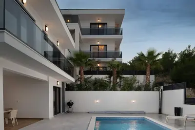 Image de Villa Palm Bay 1 & 2, heated pool - 5 m from the sea, private parking, with stunning sea view, nice terrace, beach access.