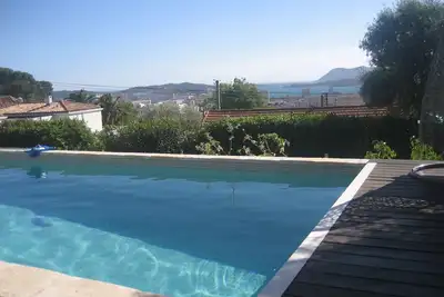 Image de Villa, Piscine salle de fitness. spa. Superbe vue mer. Jardin. Quartier résidentiel