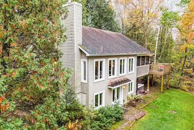 Image de Chalet bord de rivière Tranquille & Privé Spa Billard Quai a 20 min de Tremblant