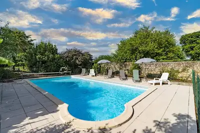 Image de Maison de vacances 'Maison En Pierre Piscine Clim' avec piscine privée, Wi-Fi et climatisation