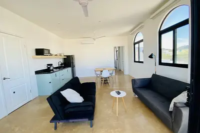 Image de Apartment with mountain view, private balcony and access to beach front terrace.